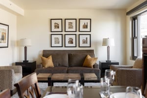 The dining room and living room meet, historic local photographs nod to the towns rich mining past