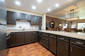 Kitchen opens to dining and living area