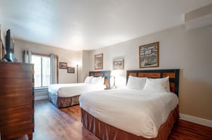 Two queen beds in the bedroom