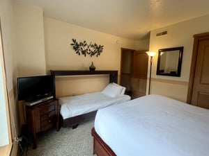 The second bedroom has a queen size bed and twin Murphy bed.