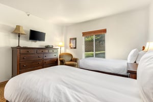 The second bedroom has two twin beds that can be converted to a kingsize bed with at least 24hours advanced notice.