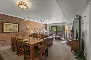 Park Station 121 has a dining area with seating for 6 and an open concept living area.