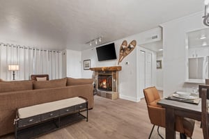 Park Station 216 has a flat screen TV and wood burning fireplace.