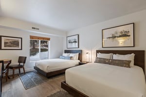 The second bedroom has two queen size beds and wellappointed furniture.