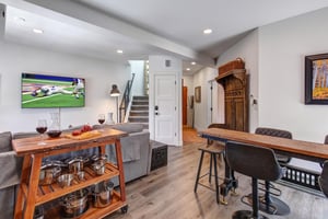 The open concept floor plan  kitchen, dining area, and living area.