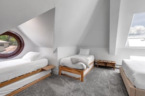 The second bedroom with two twin beds and twin trundles.