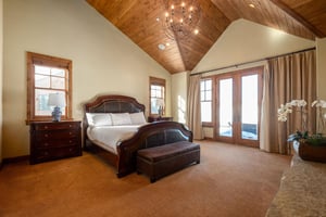 First main bedroom suite with patio access to hot tub