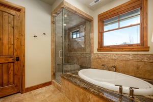 Soaking tub in the second main bathroom