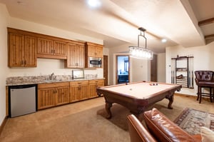 Billiards table and wet bar