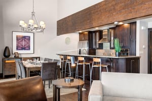 The dining area and open concept kitchen with island.