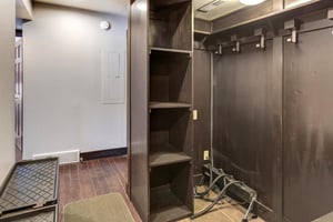 The spacious closet has plenty of storage.