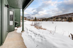 The lake covered with winter snow and mountain views.