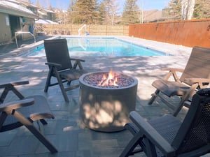The firepit and sitting area next to the Lakeside pool