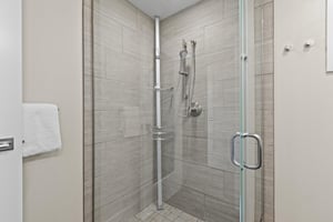 The en suite bathroom with a walk in shower.