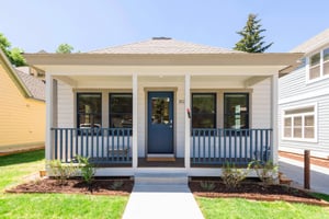 1021 Park Ave entryway on a sunny day with blue skies and green grass
