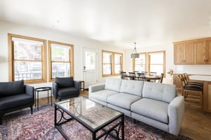The main level is flooded with abundant natural light and windows throughout