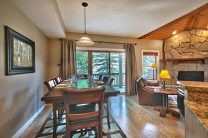 Dining room with solid wood table and seating for 6 adjacent the living room