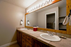 Ensuite main bedroom bath, double vanity and oversized vanity mirror