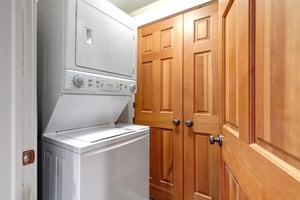 Equipped with an inunit washer and dryer plus a custom wardrobe, your laundry day is effortless and your clothes stay neatly stored and ready to go.