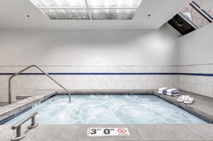 Take a refreshing dip in the indoor hot tub, perfect for yearround relaxation.