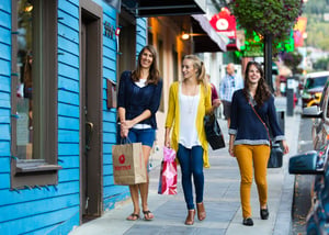 Visitors shopping and exploring the colorful shops and boutiques along Historic Main Street in Park City.