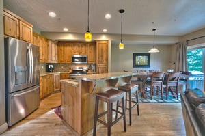 Beautiful kitchen, hardwood floors throughout and wood cabinetry with granite countertops and kitchen island.