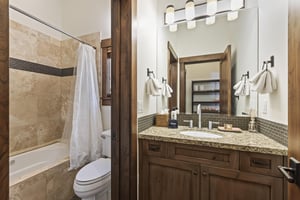 Town Lift Chalet has a shared bathroom on the main level of the floor with a separate water closet and tubshower combo.