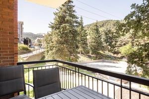Private furnished patio overlooking the Park Station courtyard and surrounding mountains.