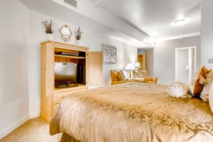 Main bedroom king bed large screen TV