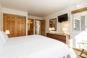 Lush king bed in the main bedroom