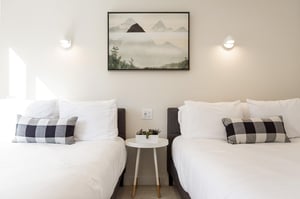 Two double beds in the guest bedroom