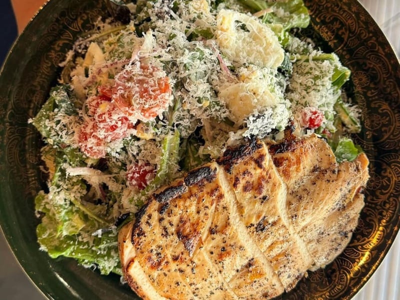 The Goat Cheese Caesar salad with grilled chicken