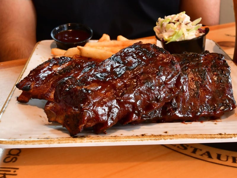 Dixie Style Baby Back Ribs with coleslaw and fries
