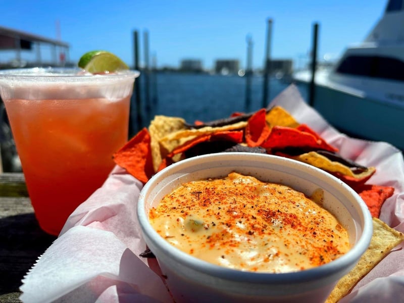A margarita and the crawfish queso