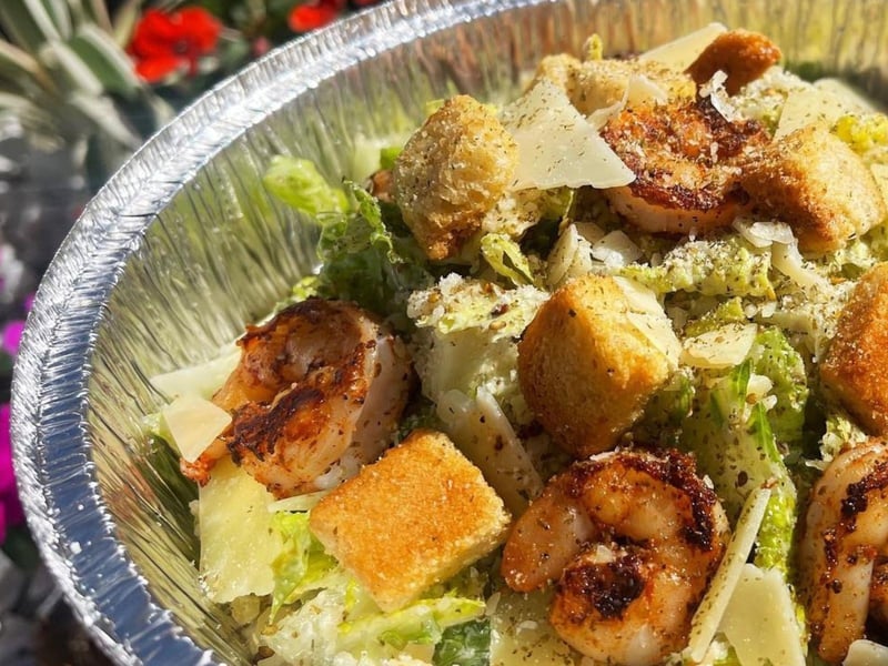 The Caesar salad with shirmp and a black garlic Caesar dressing