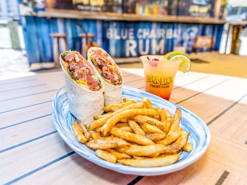 A tuna wrap with french fries