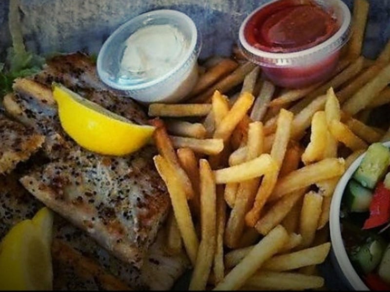 A seafood basket with french fries