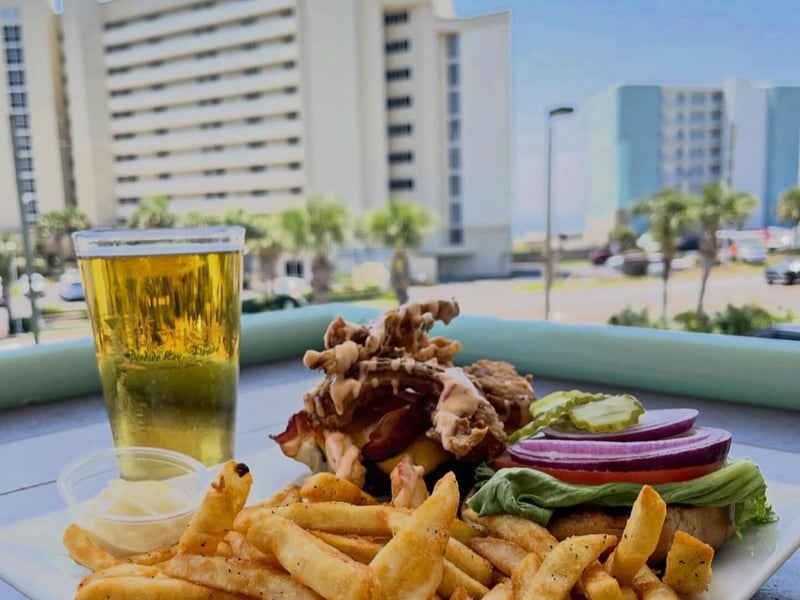 A bacon burger with french fries