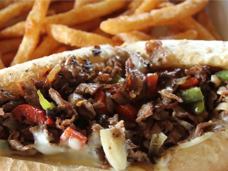 1384440 The Philly Cheesesteak At Sunset Grille