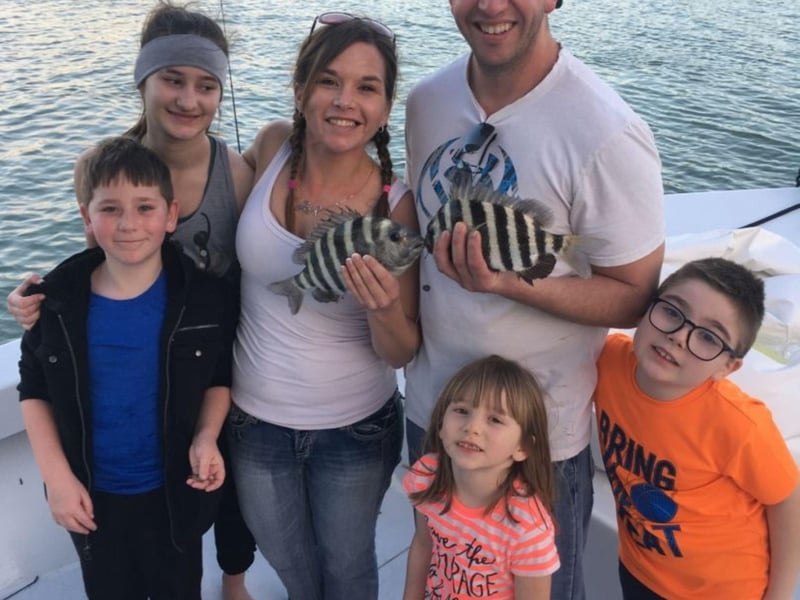 A family with Captain Jacks Fishing Charters