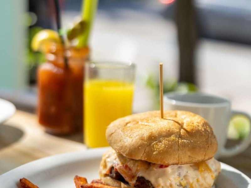 The burger with friend green tomatos and pimento cheese