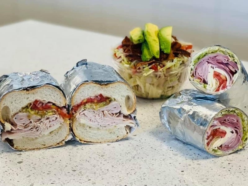 The lunch menu features sandwiches and salads