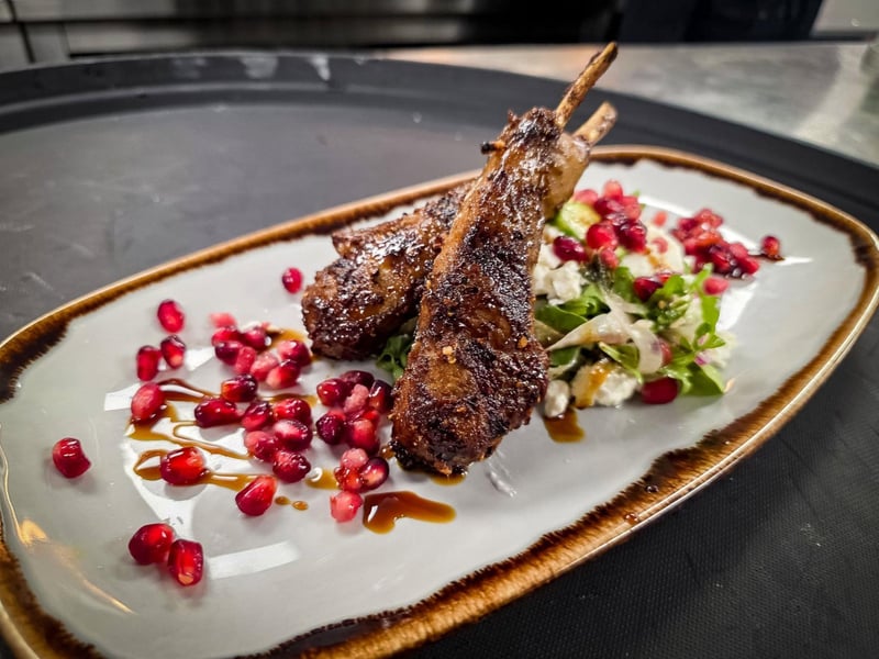 Grilled lamb lollipops with pomegranate molasses