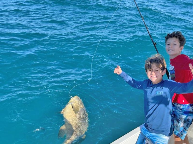 Two kids fishing with Born 2 Boogie