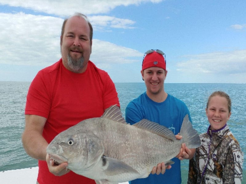 A family on the boat in Marco Island, Florida