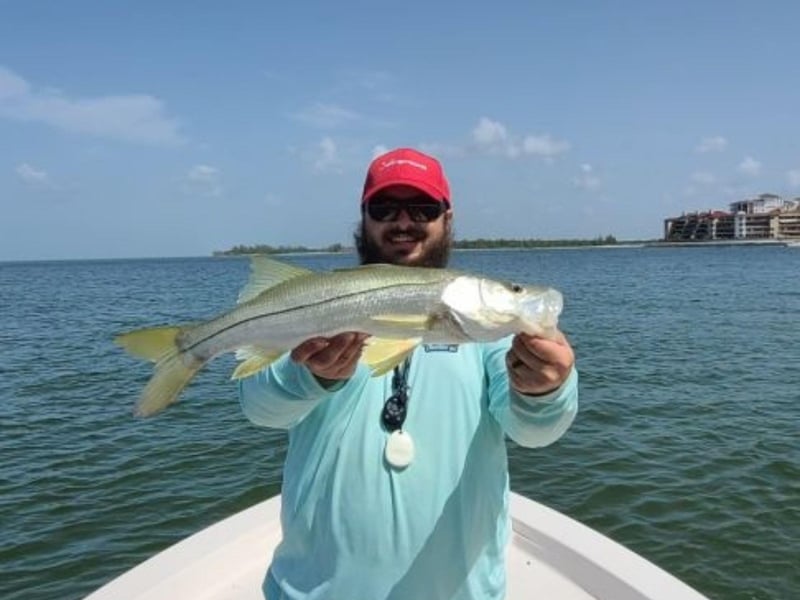 A man with his catch in Marco Island, Florida