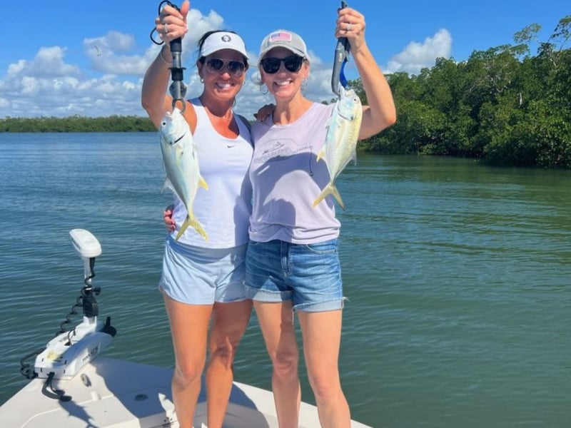 Two anglers with catches