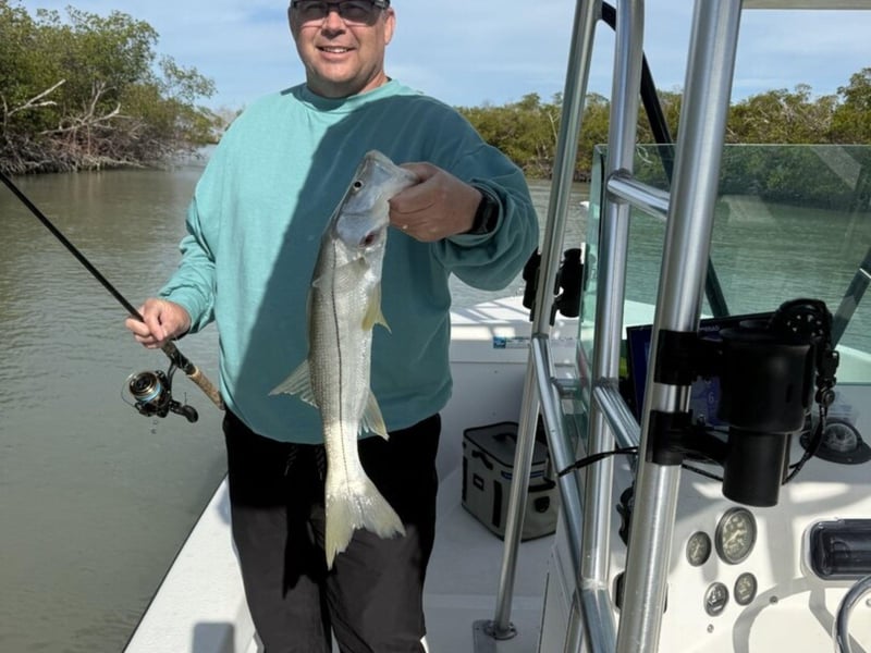 An angler on board Wishin I Was Fishin Charters