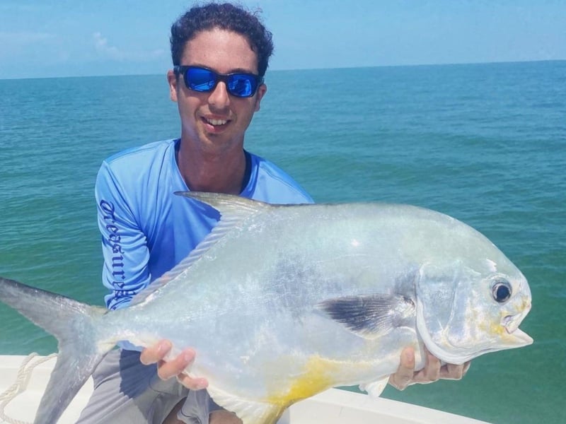 An angler showing off his catch