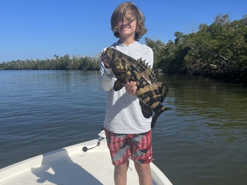 A kid with his fish